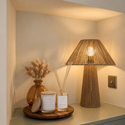 Ivy & Sage  ceramic candle styled with reed diffuser in a warm, cosy home setting.