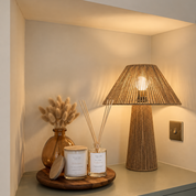 Ivy & Sage Volcano ceramic candle styled with home fragrance products in a warm, cosy interior.