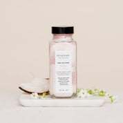 Salt Soak with coconut on white marble slab