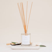 Ivy & Sage Maldives reed diffuser with natural reeds, styled with soft botanical and coastal-inspired details.